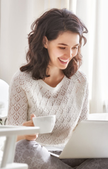 Woman takes online bookkeeping classes on her laptop